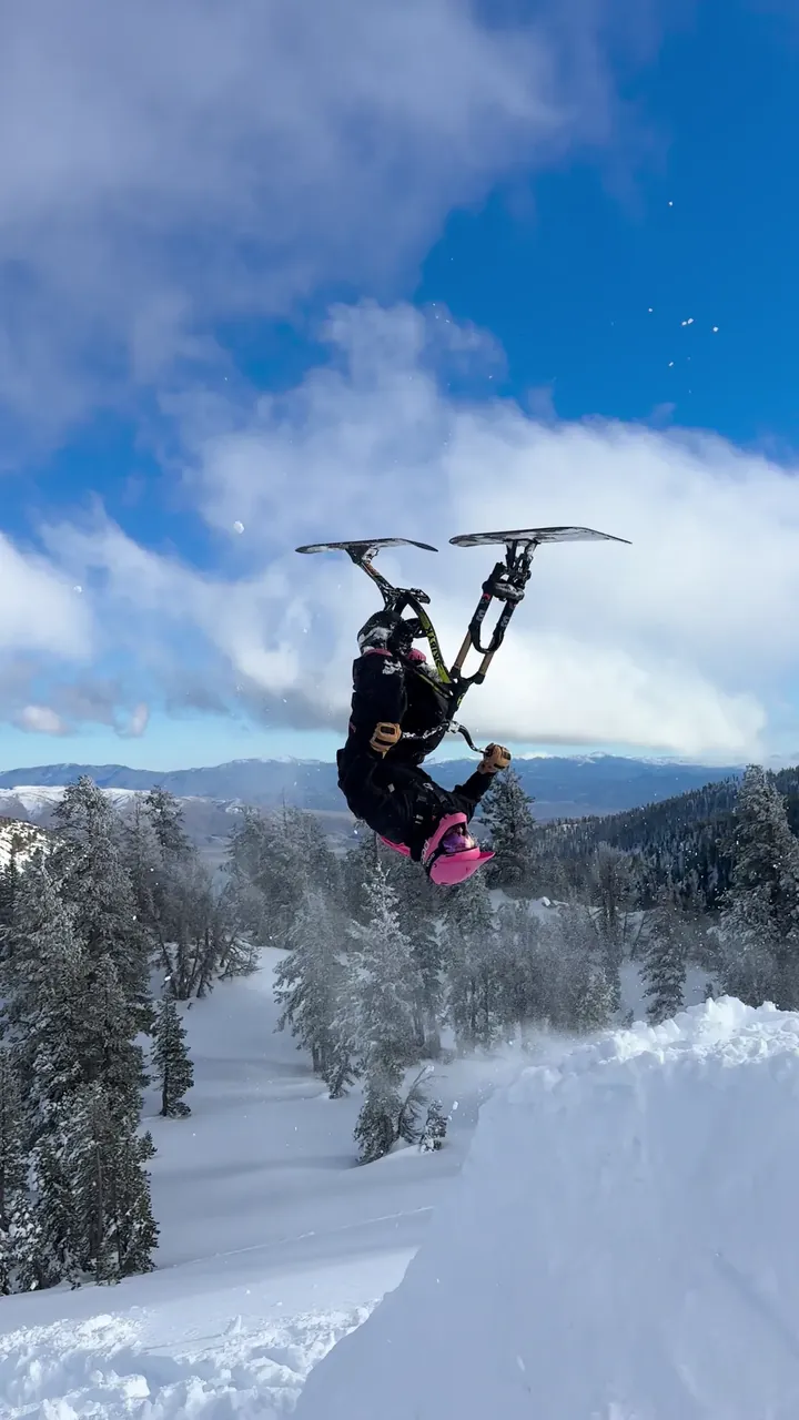 Daniel Behar backflipping a ski bike, frame 8 of 16